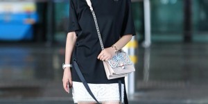 A big T-shirt and bodybuilding pants are youthful and age-reducing (who would believe that she is 47 years old)