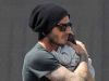 Beckham is traveling with his daughter in his arms, Beckham is still as hot as ever after giving birth