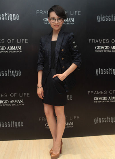 The suit and black-framed glasses are the  ol's favorite